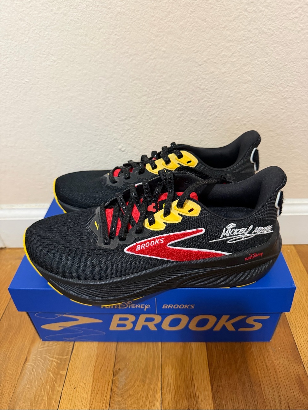 Brooks Black Running Shoes with Red & Yellow Accents
